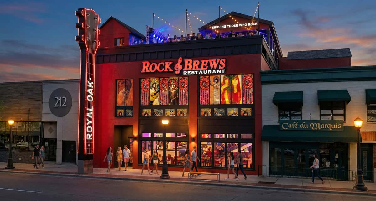 Rock & Brews restaurant façade at dusk with a vertical neon guitar sign and people walking along the sidewalk by the lit windows.